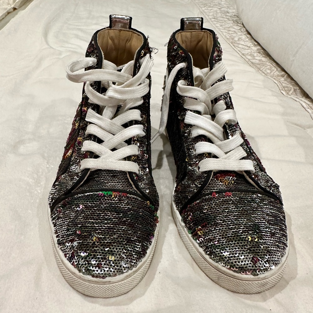 Sequin high top Louboutin sneaker.